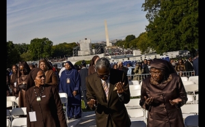 Attendees are led in prayer at a rally convened by Nation of Islam leader Louis Farrakhan and billed as “Justice or Else” to mark the 20th anniversary of the Million Man March on the National Mall in Washington, Oct. 10, 2015. The original Million Man March took place on Oct. 16, 1995. (Reuters/James Lawler Duggan)